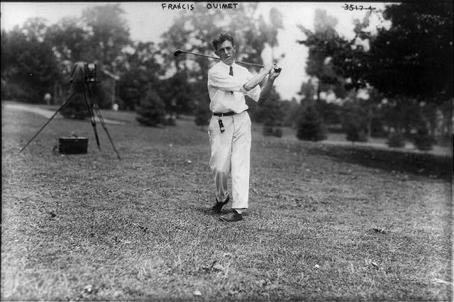 Francis Ouimet swinging a golf club, 1908